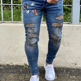 Calça Jeans Masculina Super Skinny Escura Patch Tom&Jerry