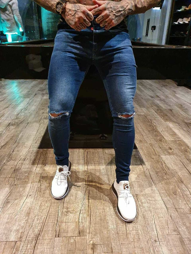 Calça Jeans Skinny Escura Rasgo No Joelho